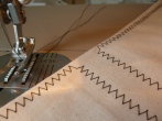 Sample of perfect zig-zag stitches after cleaning, oiling, greasing, and adjusting.